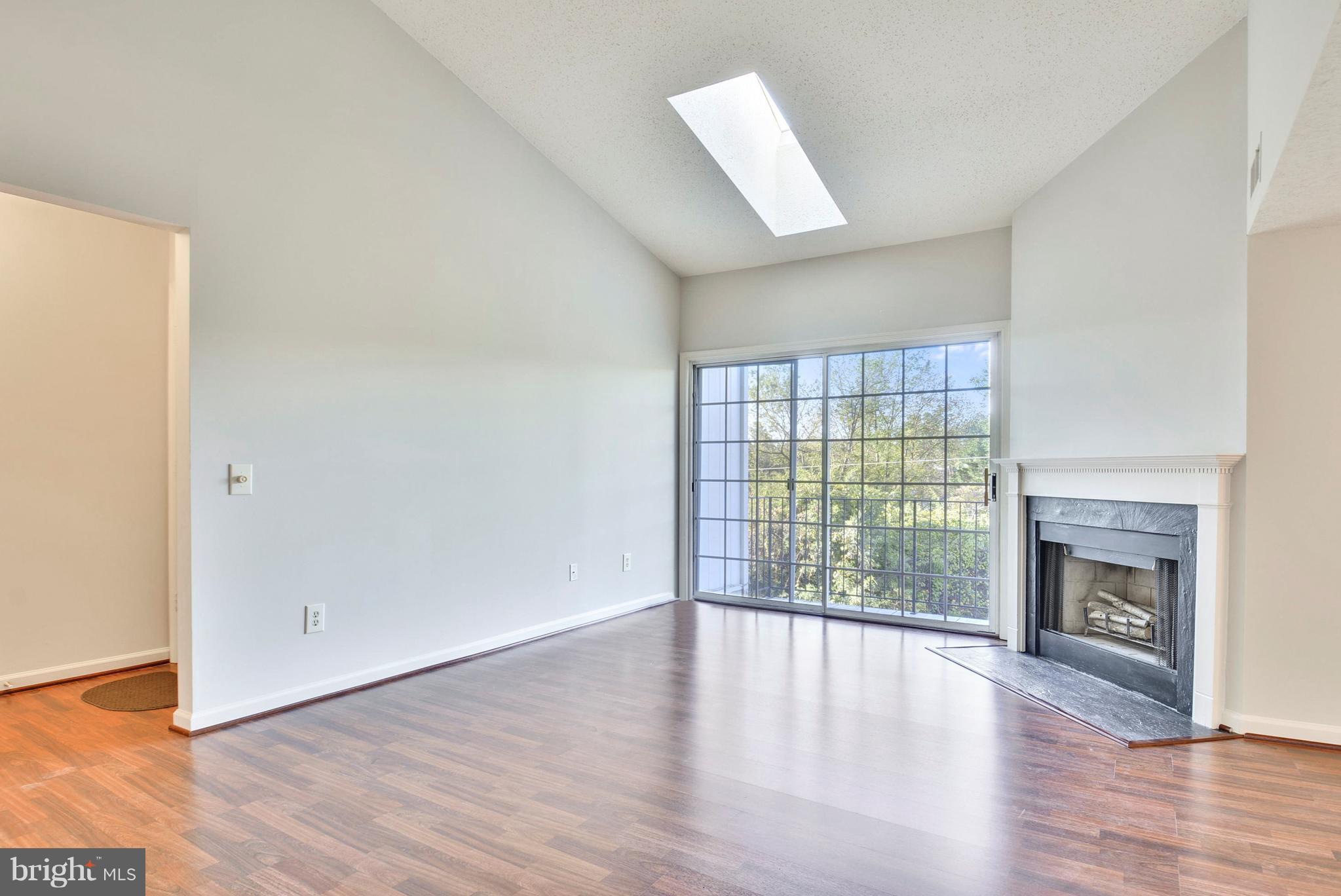 127 Fort Evans Road Southeast, Unit F Leesburg, VA 20175 - Photo 6 of 21 2 Story Living Room w/ Fireplace
