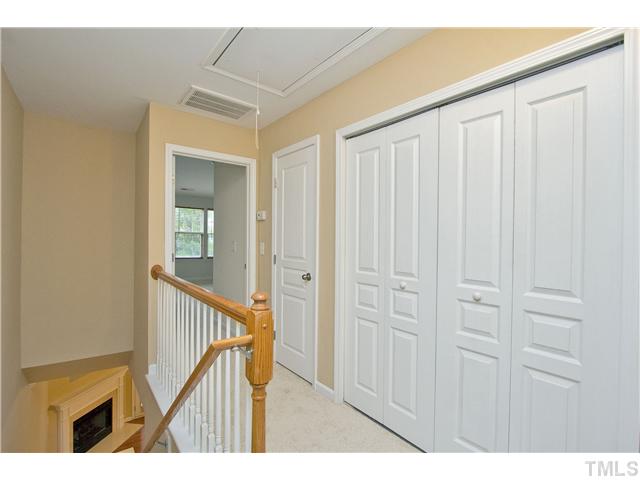 7843 Spungold Street Raleigh, NC 27617 - Photo 14 of 20 a view of a porch with wooden floor