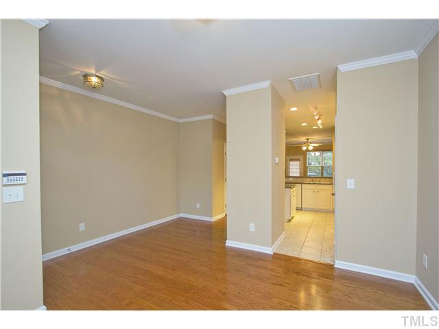 7843 Spungold Street Raleigh, NC 27617 - Photo 20 of 20 a view of empty room with wooden floor
