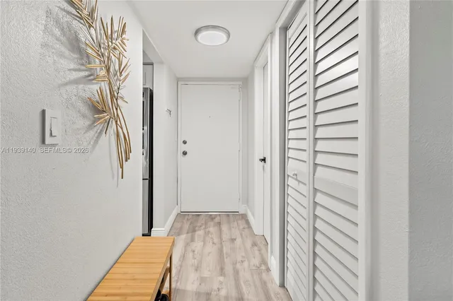 a view of a bedroom with a hallway