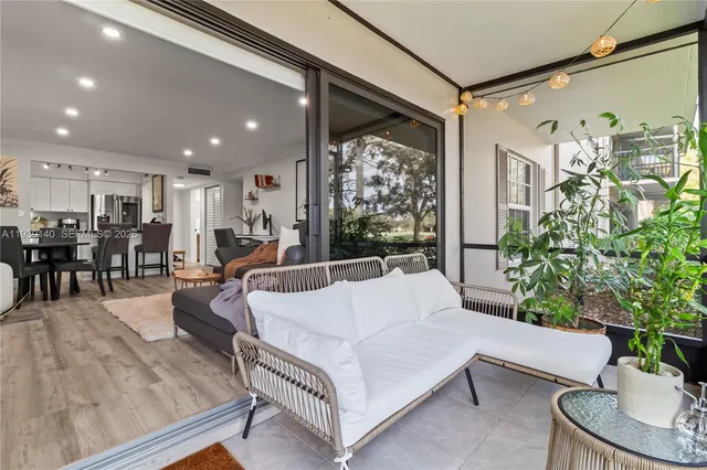 a view of an ocean yard and outdoor seating