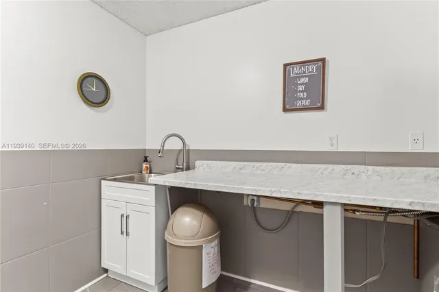 a view of swimming pool is middle in the garden