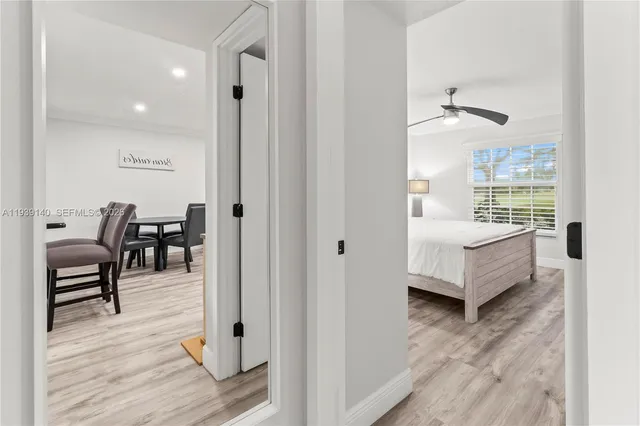 a view of swimming pool with outdoor seating