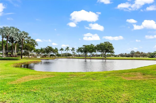 a view of a lake with a big yard