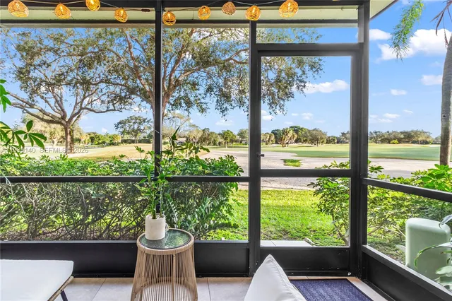 a view of a lot of furniture and a potted plant