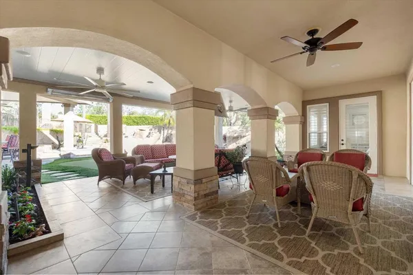 a kitchen with a stove a sink and a refrigerator