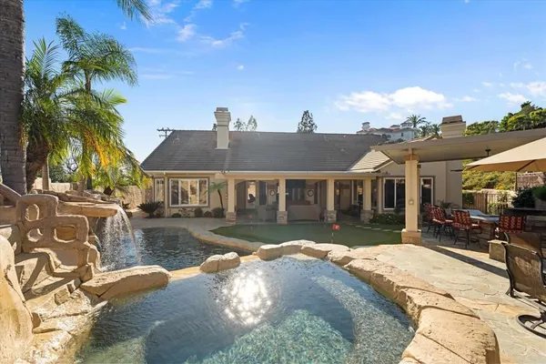 a spacious bathroom with a bathtub and shower