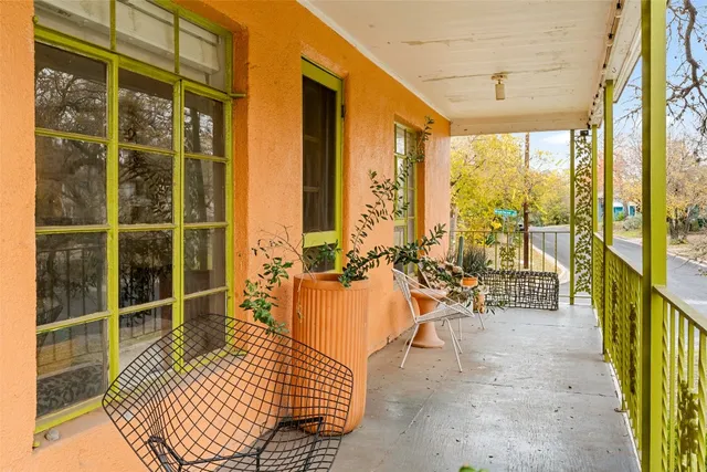 a view of balcony with chairs