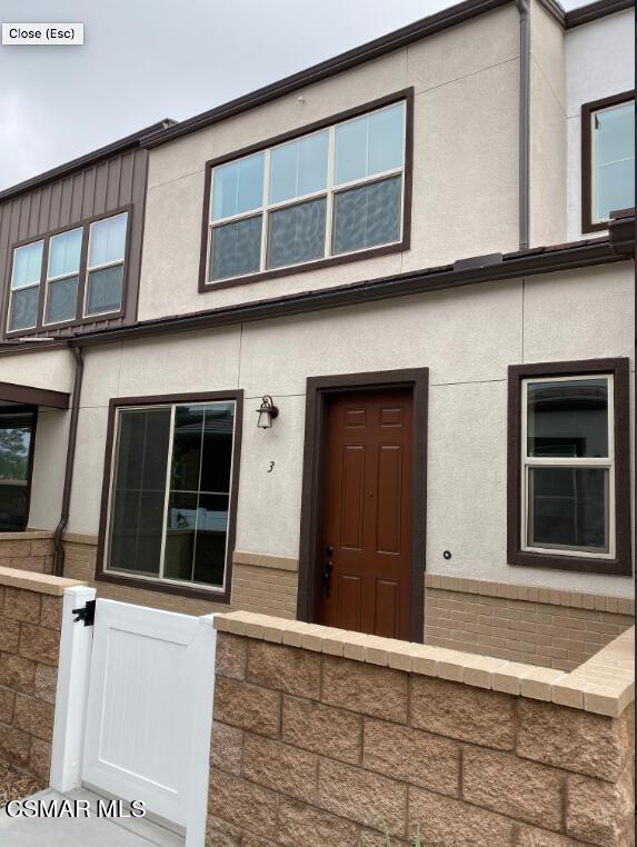 105 Red Brick Drive, Unit 3 Simi Valley, CA 93065 - Photo 1 of 14 a view of a house with a window