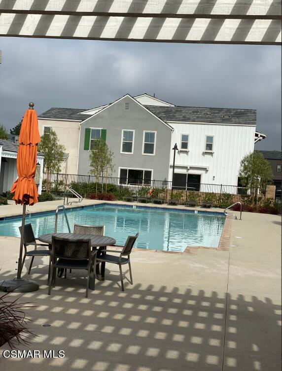 105 Red Brick Drive, Unit 3 Simi Valley, CA 93065 - Photo 13 of 14 a view of a house with swimming pool and sitting area