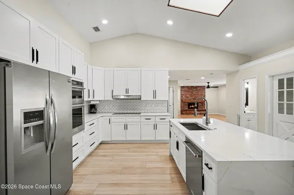 $425,000 | 2555 Kumquat Street Northeast, Palm Bay, FL 32905