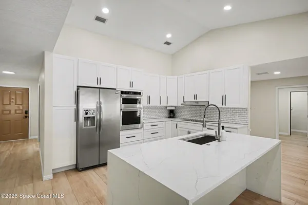 $425,000 | 2555 Kumquat Street Northeast, Palm Bay, FL 32905