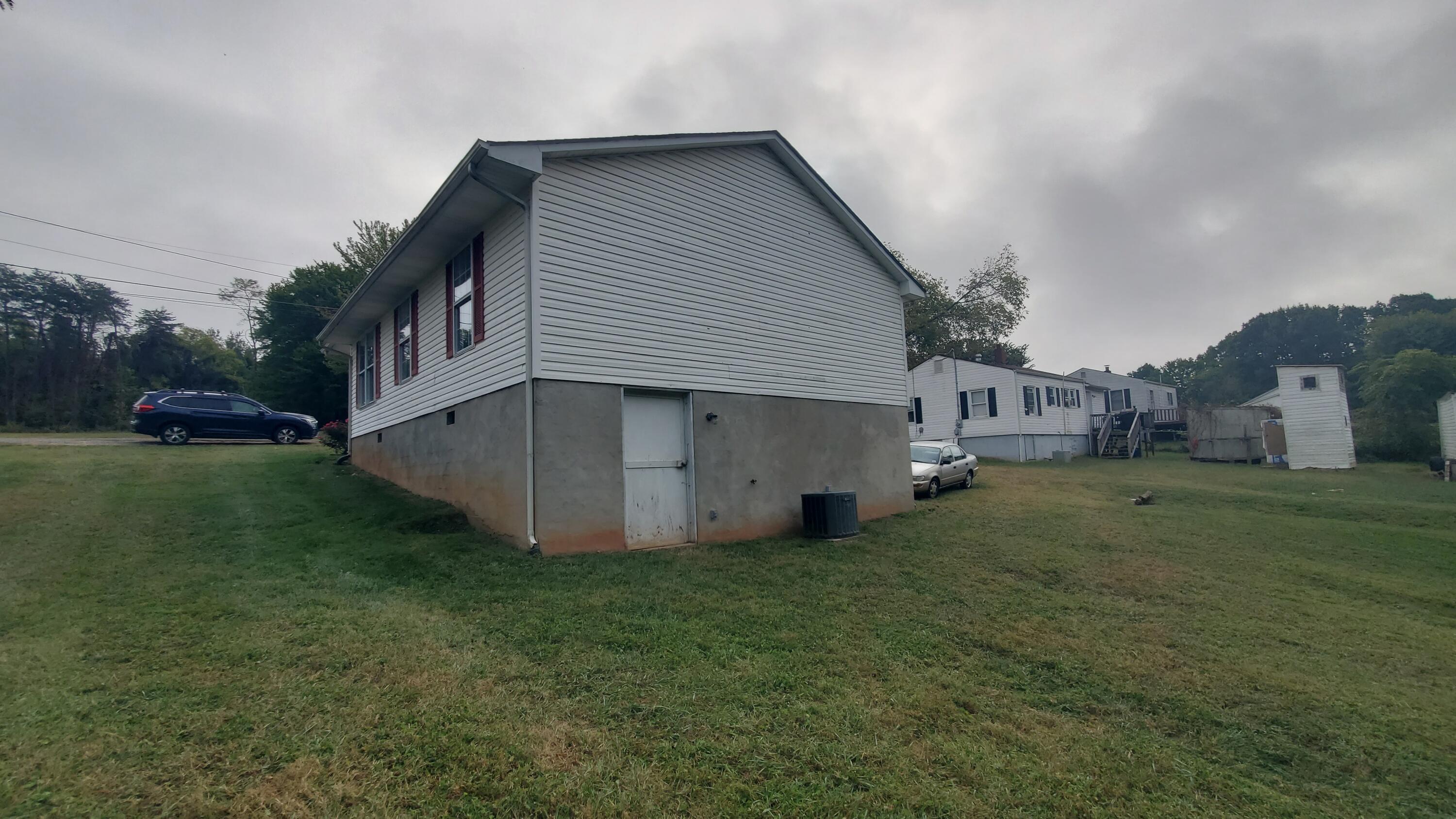 80 Honeywood Road Rocky Mount, VA 24151 - Photo 2 of 18 a house view with a outdoor space