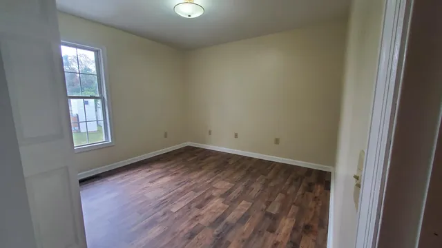 an empty room with windows