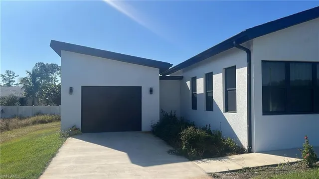 a front view of a house having yard