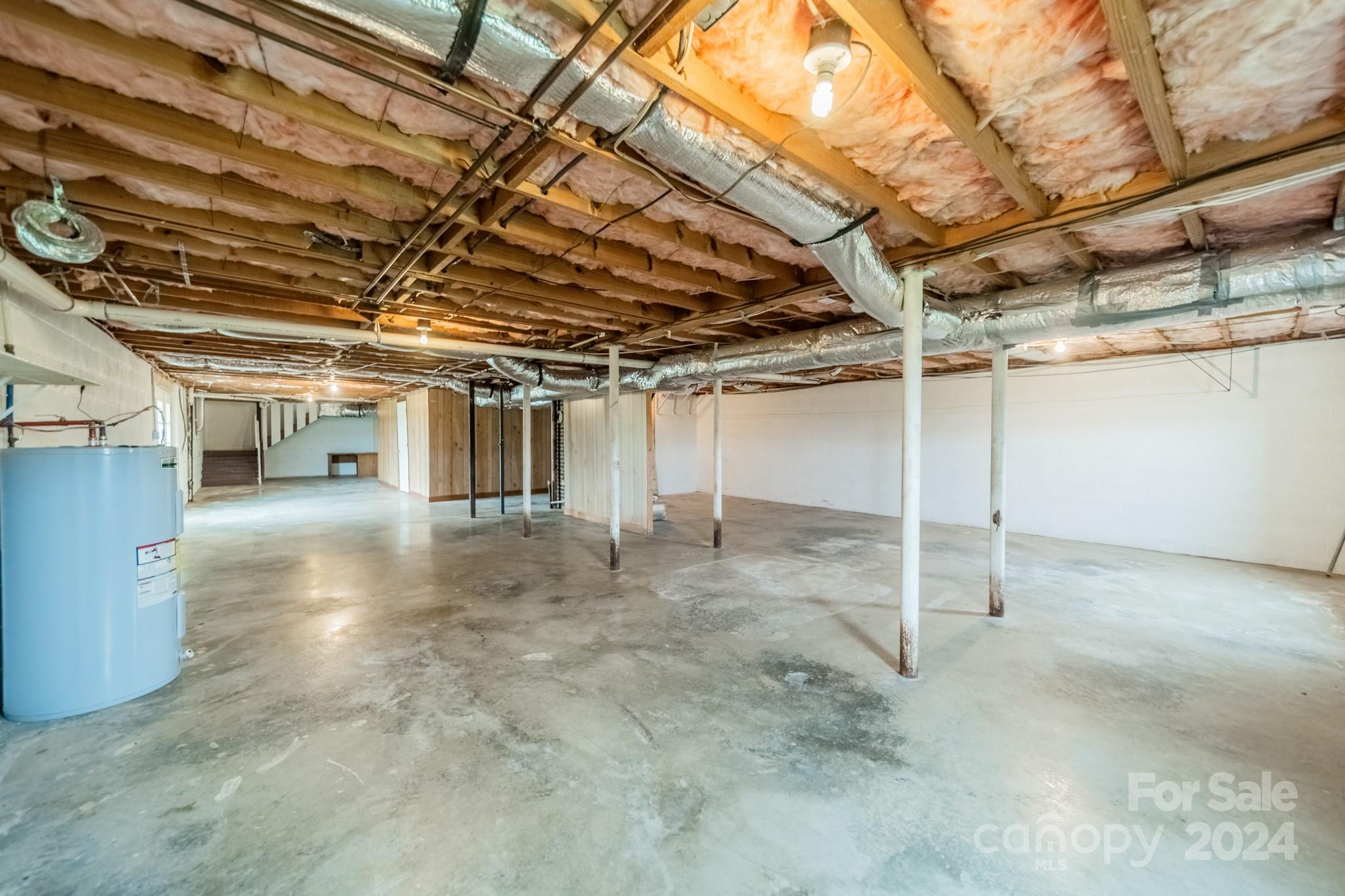 24686 Barbees Grove Road Oakboro, NC 28129 - Photo 24 of 35 a view of a room with wooden walls