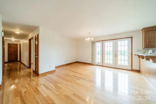 a view of a kitchen with microwave and cabinets