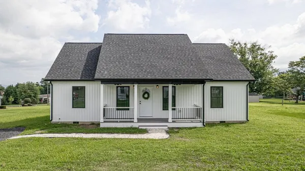 a front view of house with yard