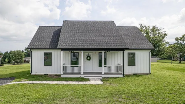 a front view of house with yard