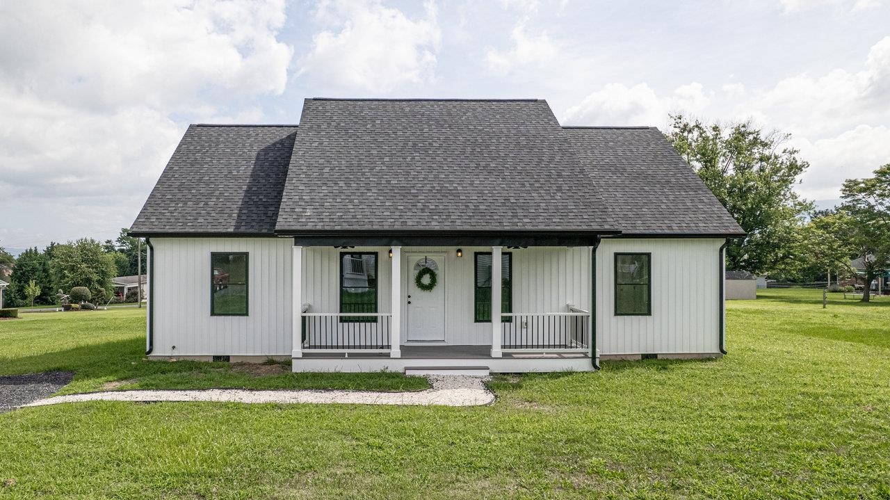 a front view of house with yard
