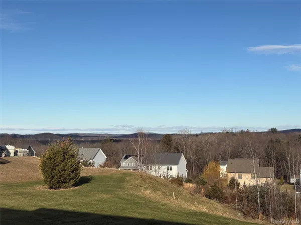 a view of a lake from a balcony