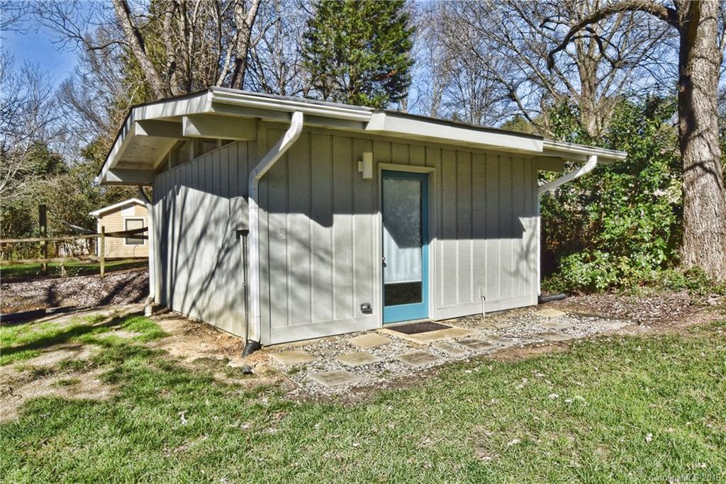3111 Spring Valley Road Charlotte, NC 28210 - Photo 20 of 24 a view of a house with a yard