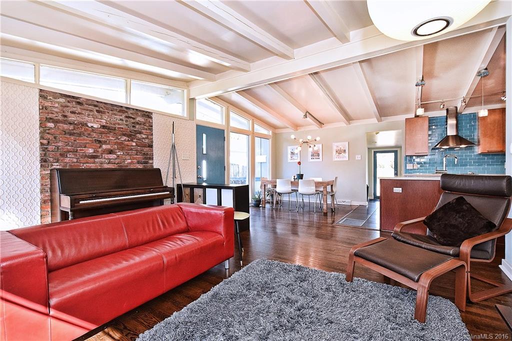 3111 Spring Valley Road Charlotte, NC 28210 - Photo 3 of 24 a living room with furniture a rug and a window