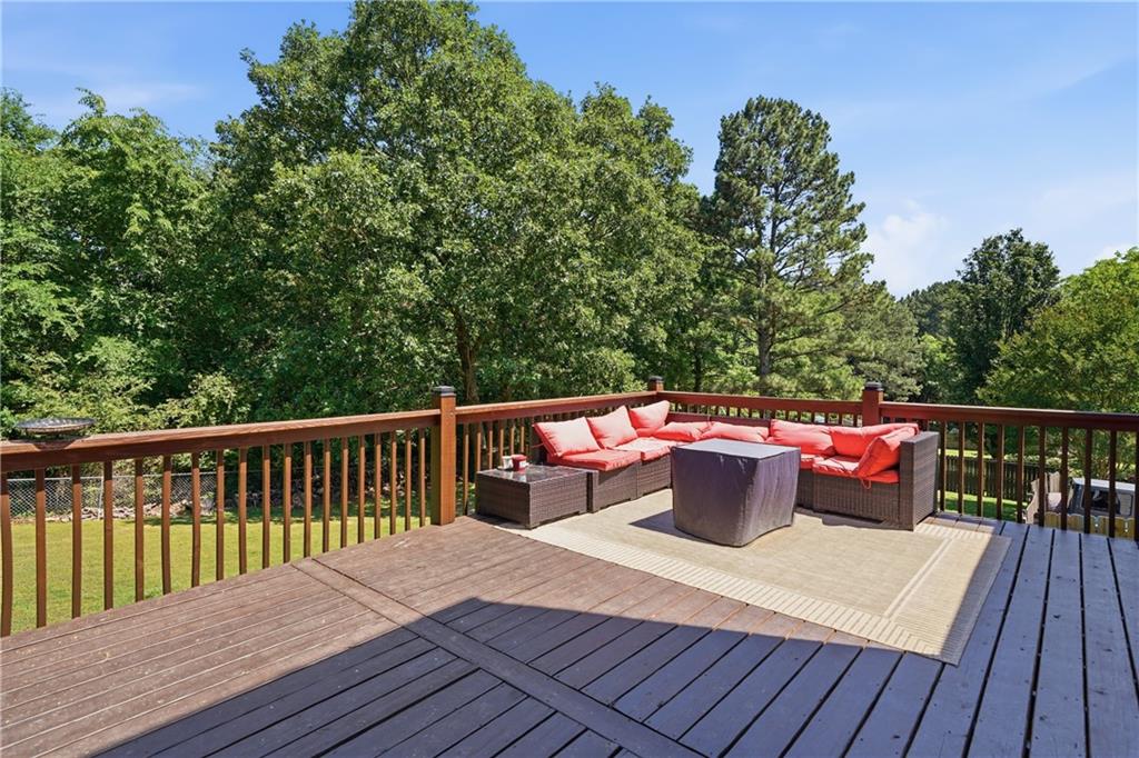 137 Orchard Way Southeast Calhoun, GA 30701 - Photo 39 of 39 a balcony with wooden floor and fence