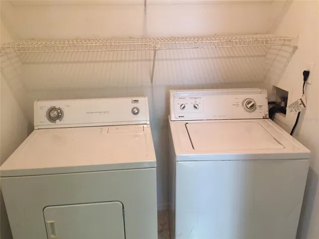 a utility room with dryer and washer