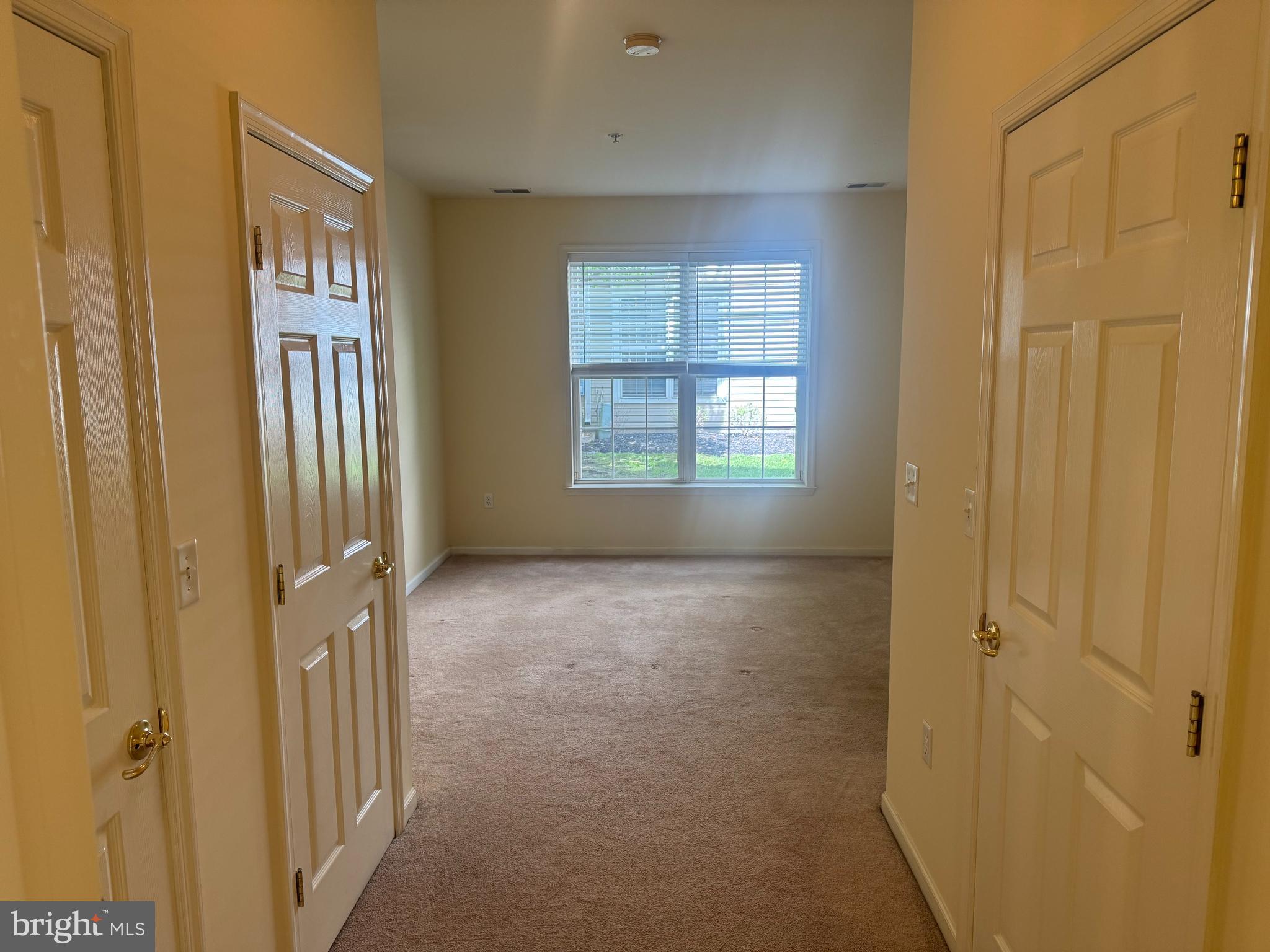 113 Kyle Way Ewing, NJ 08628 - Photo 7 of 25 a view of an empty room with a window