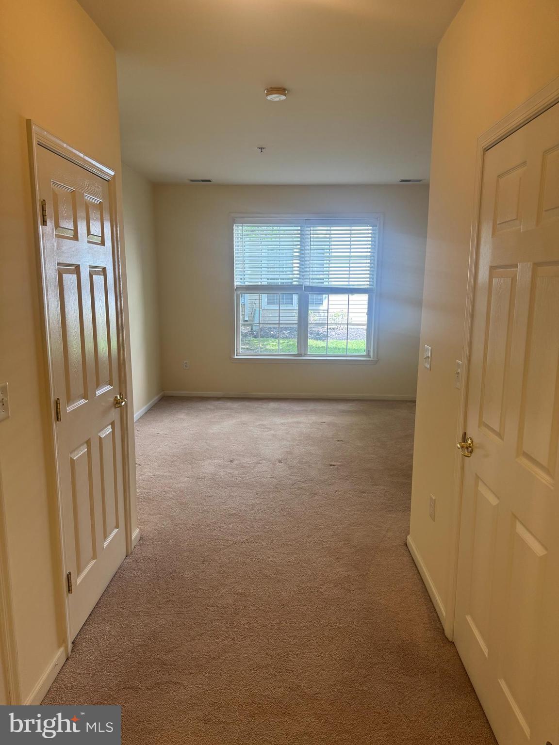 113 Kyle Way Ewing, NJ 08628 - Photo 8 of 25 a view of an empty room with a window