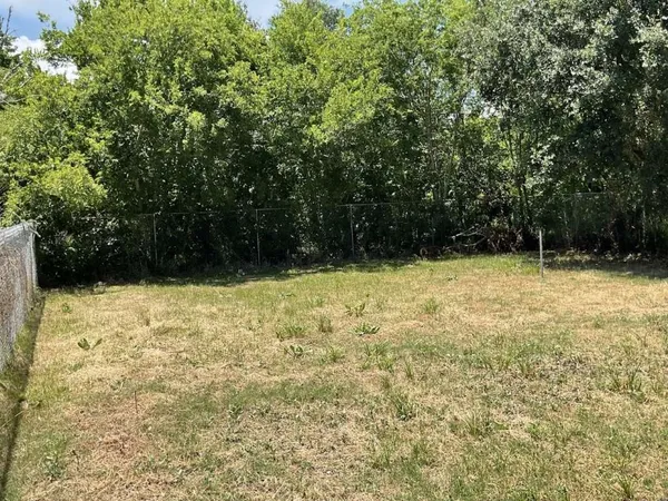 a view of outdoor space and yard