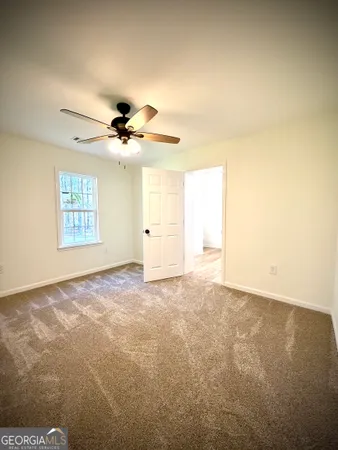 en view of an empty room with a window