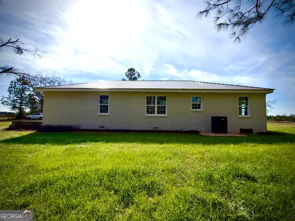 a house view with a garden space
