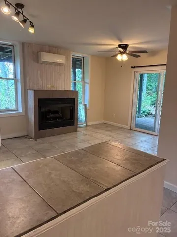 a kitchen with granite countertop a sink and cabinets