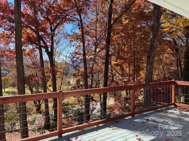 a view of kitchen with cabinets and wooden floor