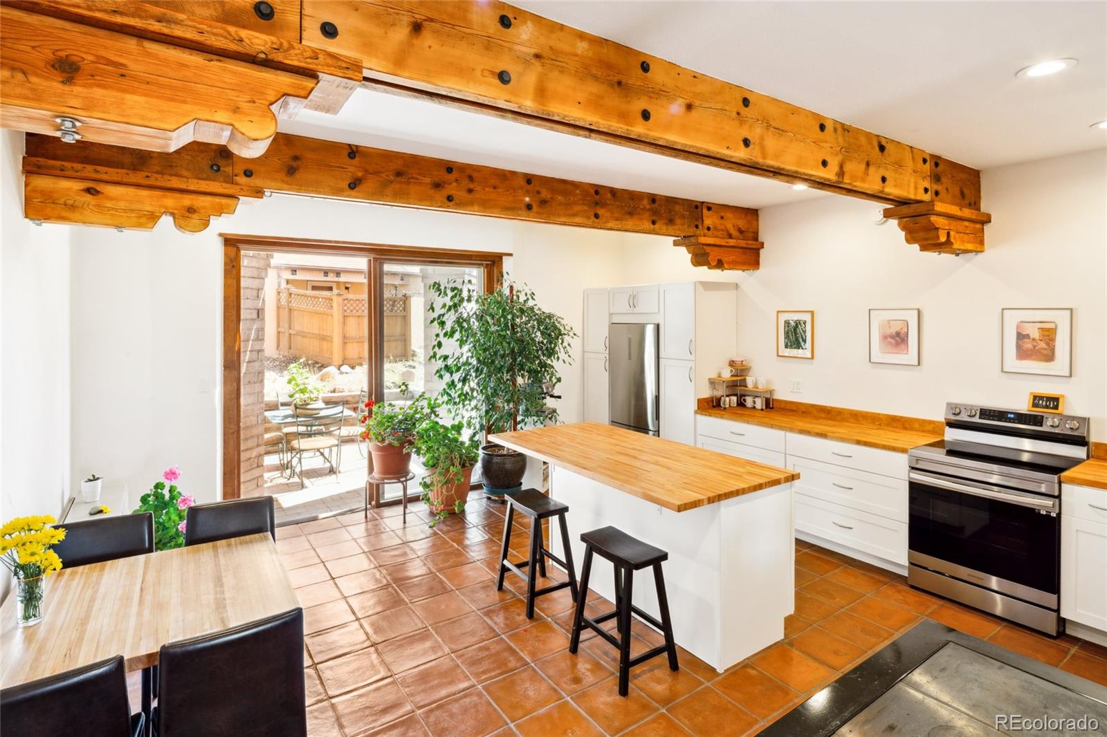a dining room with a table and chairs