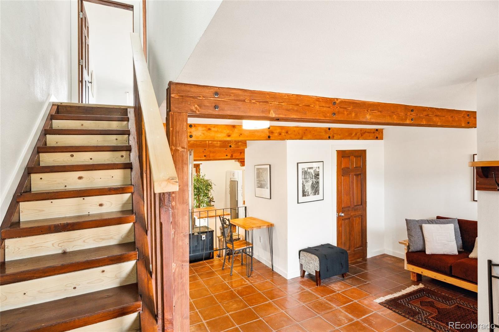 11 Baca Grant Way Crestone, CO 81131 - Photo 13 of 45 a view of an entryway with wooden floor and a livingroom view