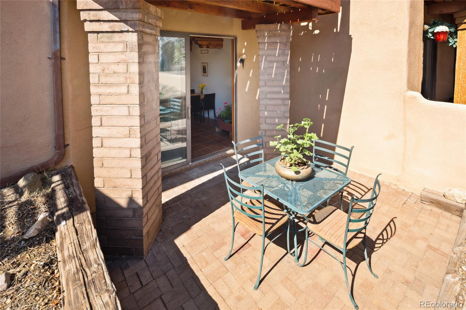 11 Baca Grant Way Crestone, CO 81131 - Photo 24 of 45 a view of a dining room with furniture and wooden floor