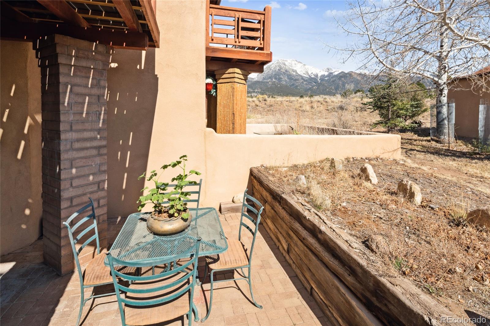 11 Baca Grant Way Crestone, CO 81131 - Photo 25 of 45 a view of a chairs and table in a microwave