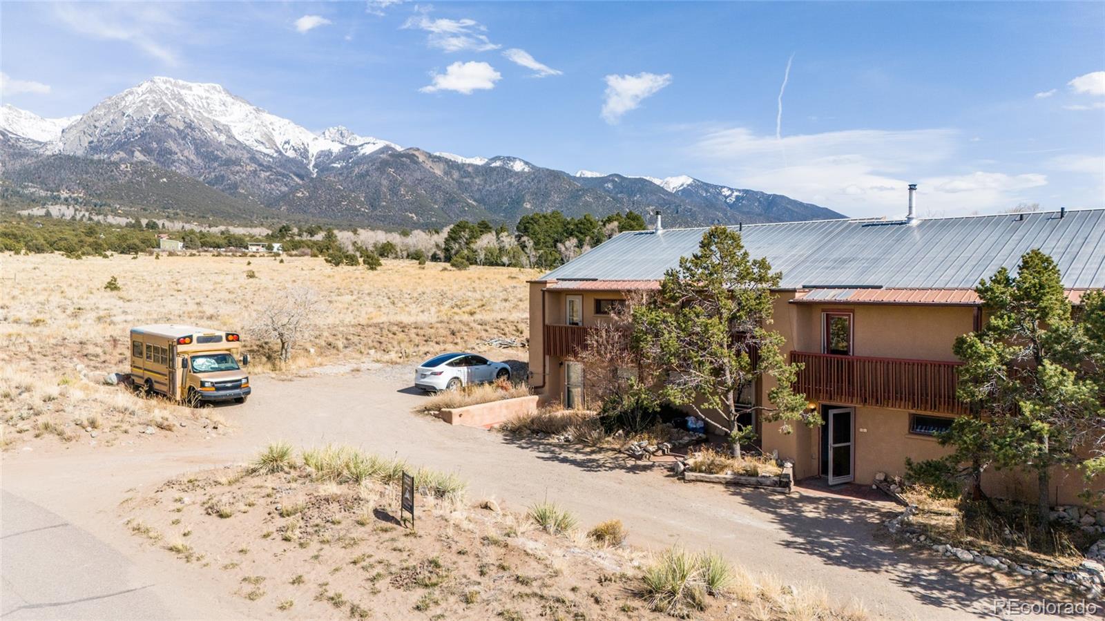 11 Baca Grant Way Crestone, CO 81131 - Photo 4 of 45 a view of a house with a snow in the yard