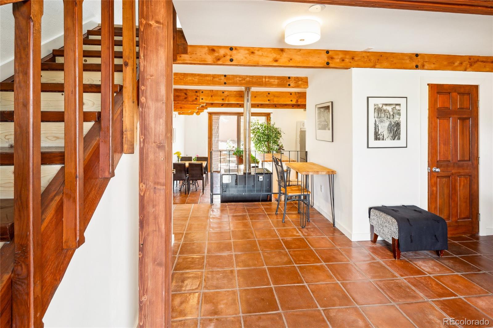 11 Baca Grant Way Crestone, CO 81131 - Photo 9 of 45 a lobby with furniture and floor to ceiling windows