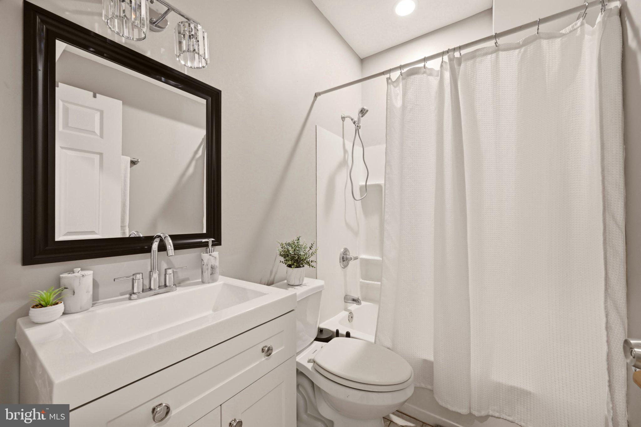 737 Morton Street Northwest Washington, DC 20010 - Photo 15 of 36 Modern bathroom with sleek finishes.