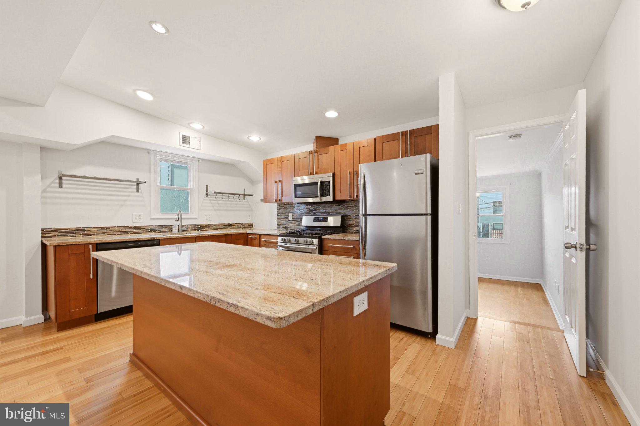 737 Morton Street Northwest Washington, DC 20010 - Photo 24 of 36 Modern kitchen with sleek finishes.