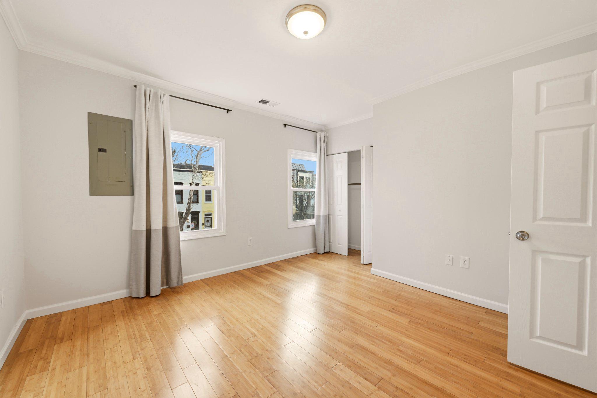737 Morton Street Northwest Washington, DC 20010 - Photo 26 of 36 2nd floor apartment bedroom #1 with natural light.