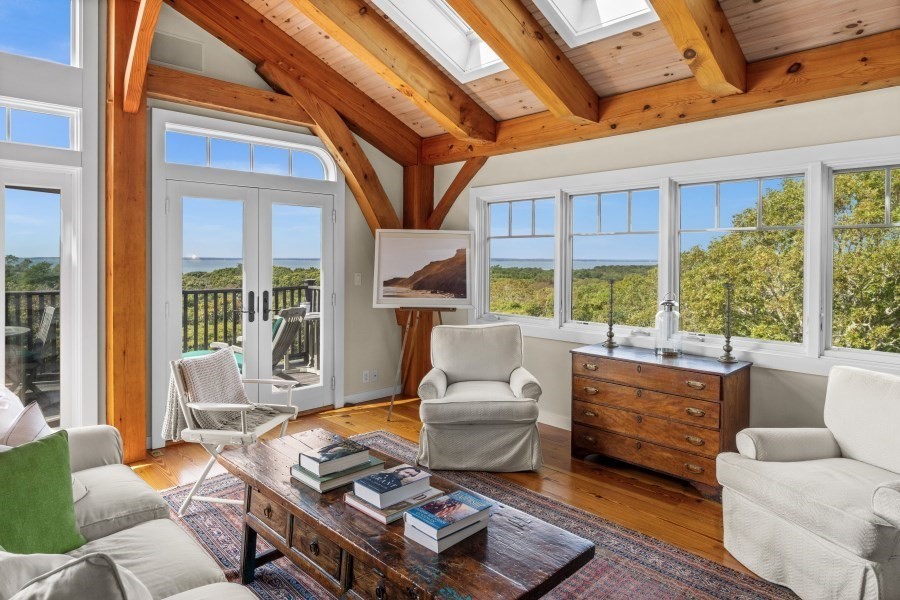 97 Longview Road West Tisbury, MA 02568 - Photo 11 of 42 a living room with furniture and a large window
