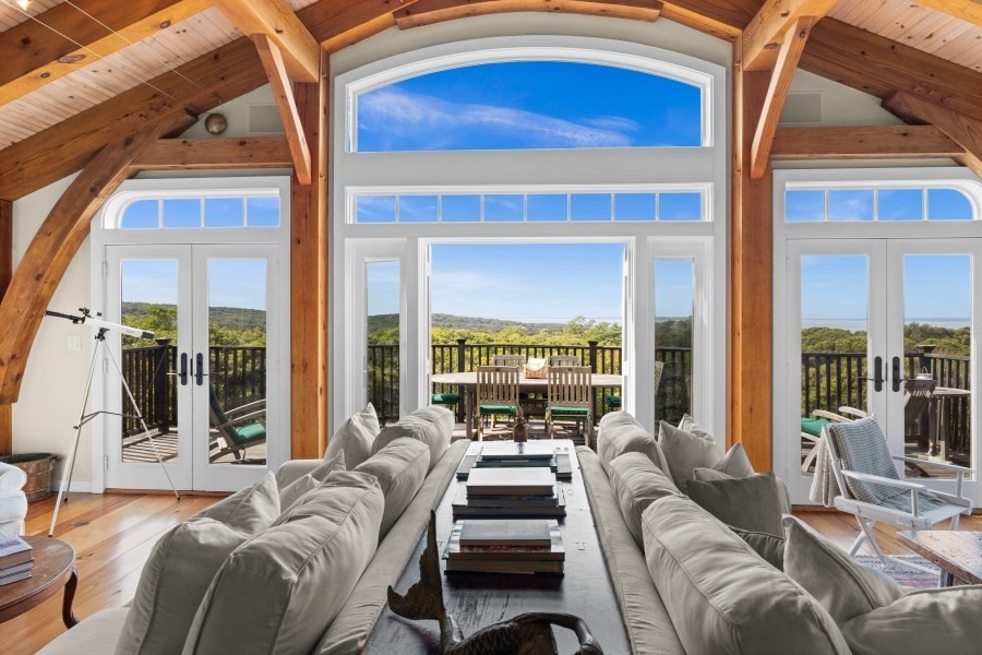 97 Longview Road West Tisbury, MA 02568 - Photo 12 of 42 a living room with furniture and a large window