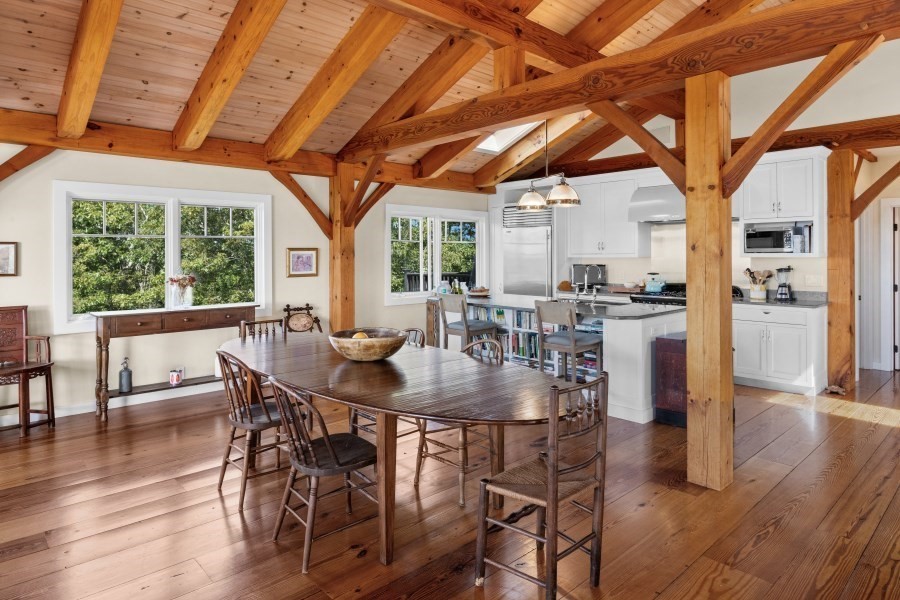 97 Longview Road West Tisbury, MA 02568 - Photo 16 of 42 a view of a dining room with furniture window and wooden floor