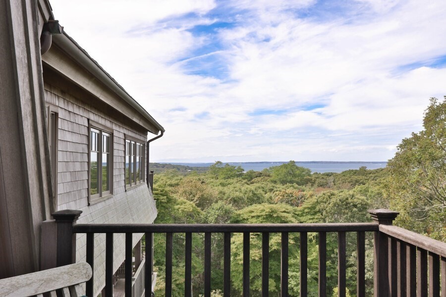 97 Longview Road West Tisbury, MA 02568 - Photo 24 of 42 a balcony with an outdoor space