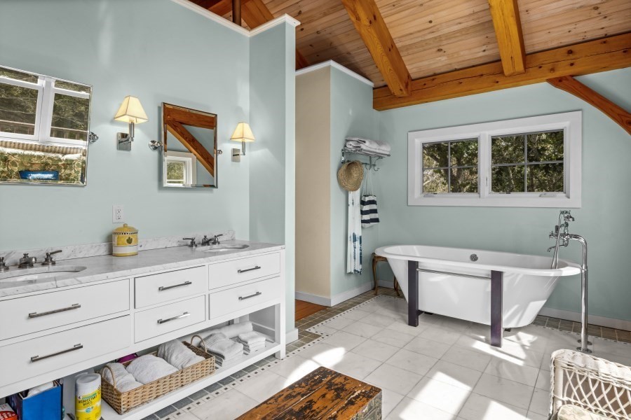 97 Longview Road West Tisbury, MA 02568 - Photo 25 of 42 a bathroom with a sink and a mirror